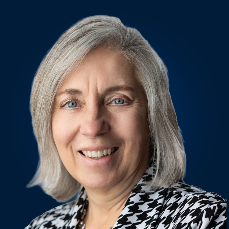 Kim Faircloth, ICF-certified coach and author, smiling in professional headshot photo
